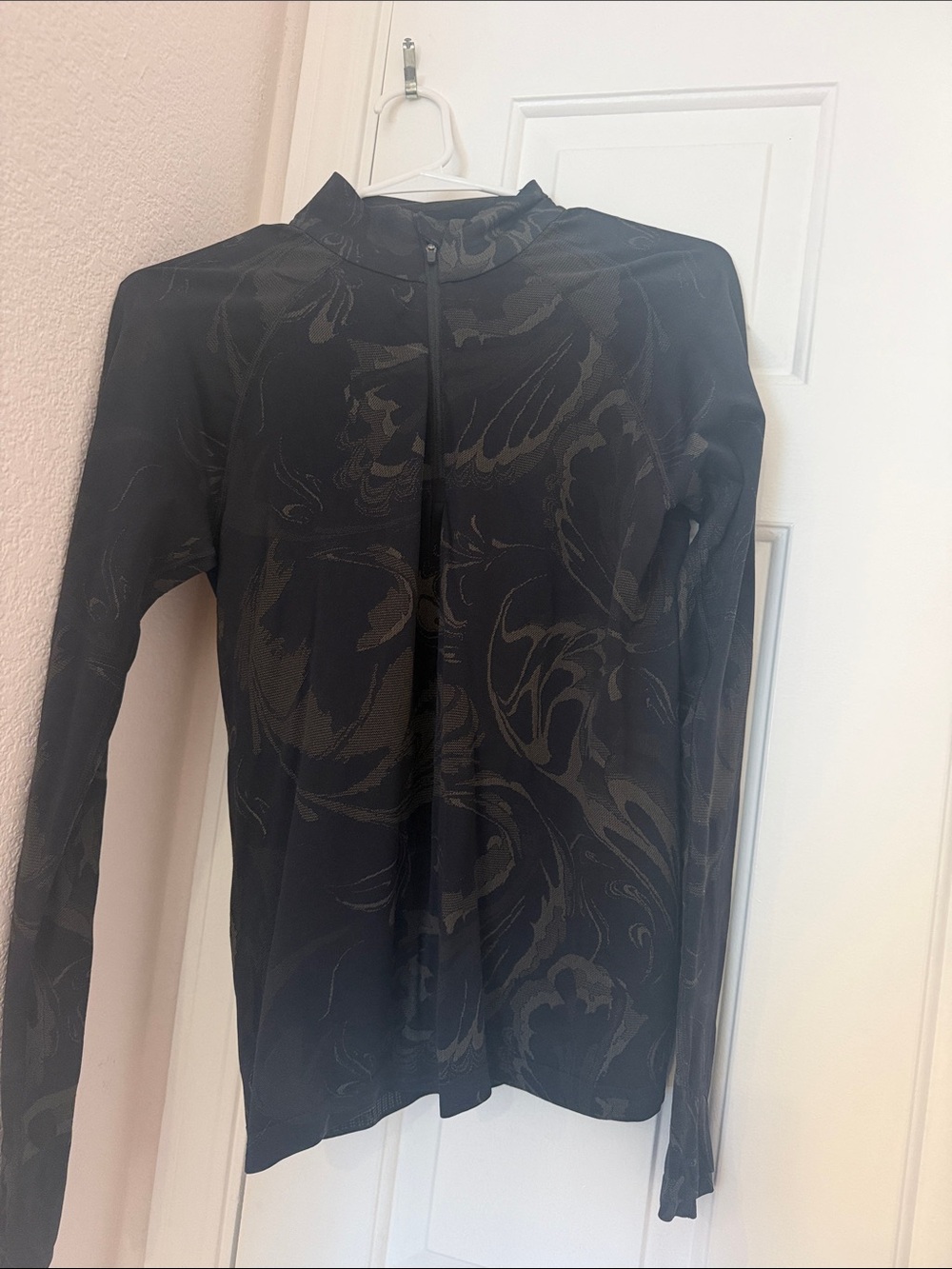 Athleta womens Black Long-Sleeve Mock Neck Shirt with Subtle Swirl Print